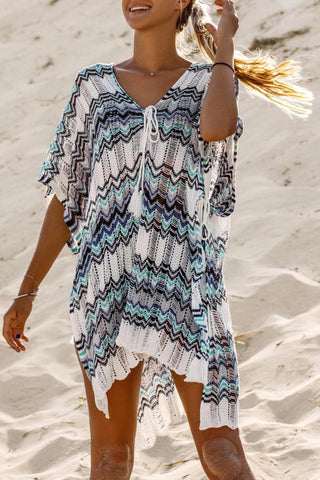 Vestido de playa tejido, de manga media y cinta al frente